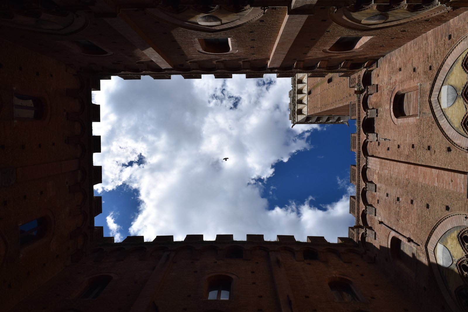 Looking up to the main tower in Siena, Italy. ouritalianjourney.com