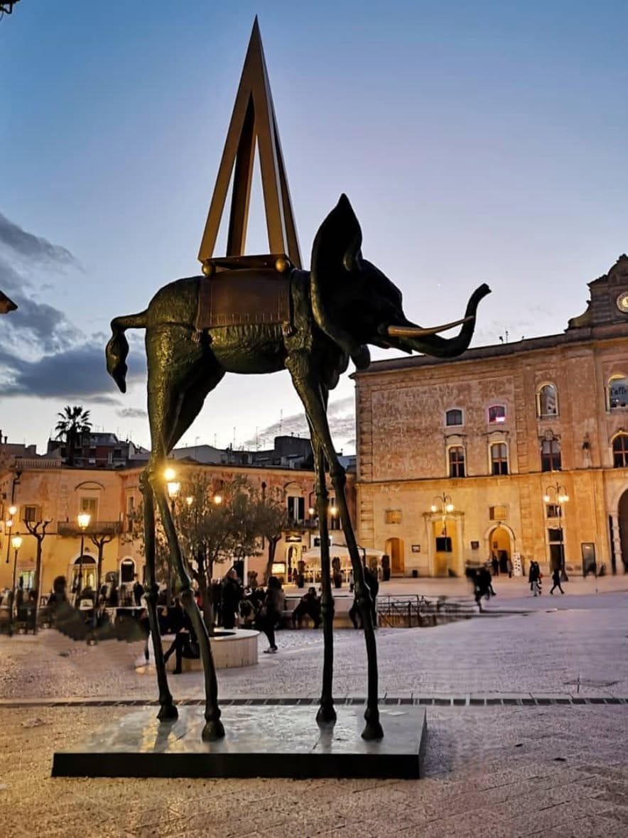 Salvador Dalí's monumental bronze sculpture, the Space Elephant (Elefante Spaziale), was placed in the historic center of Matera, Italy. It arrived as a free public installation for Matera's 2019 European Capital of Culture exhibition - ouritalianjourney.com