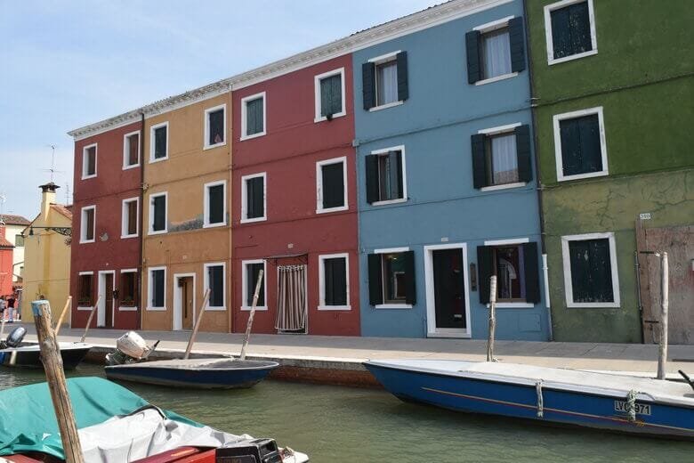 Burano with the colorful houses is a must visit - ouritalianjourney.com