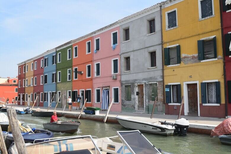 Burano with the colorful houses is a must visit - ouritalianjourney.com