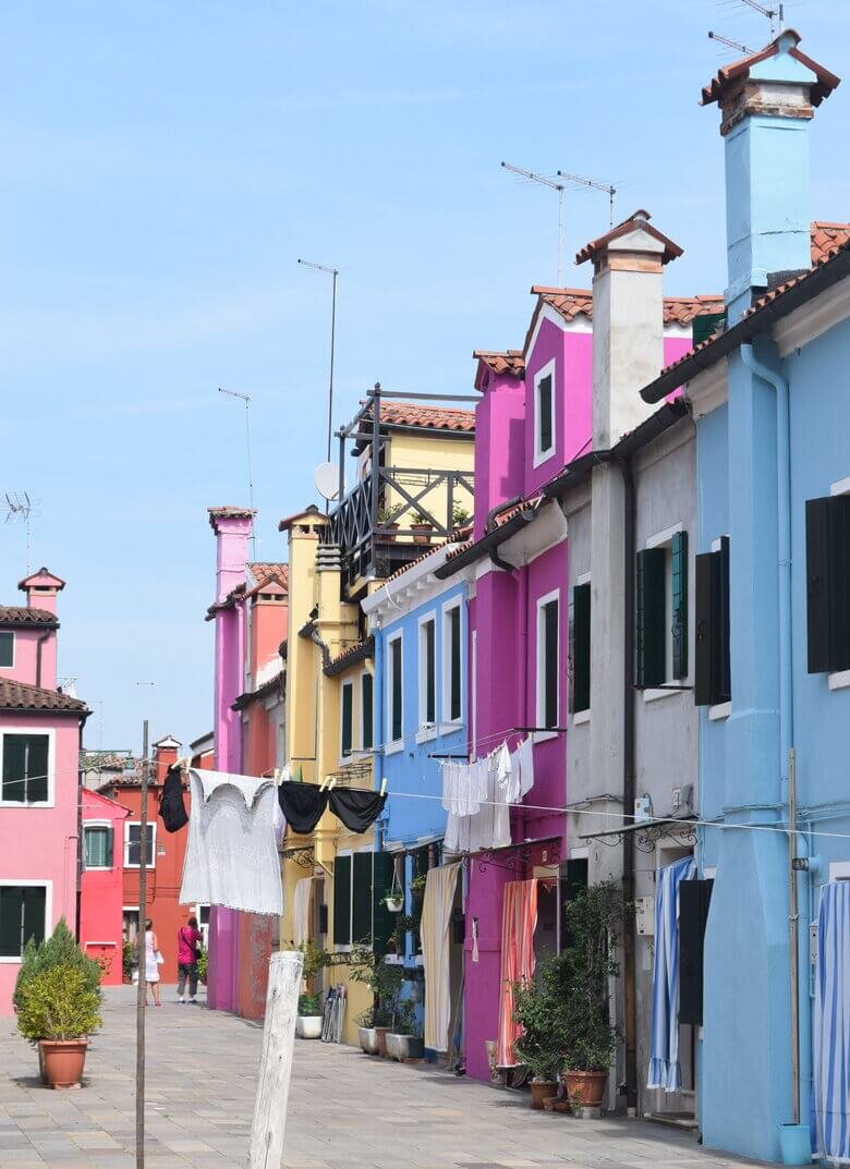 Burano with the colorful houses is a must visit - ouritalianjourney.com