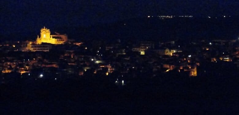 Night photo of Modica, Sicily: Discover the beauty and our funny true story. ouritalianjourney.com