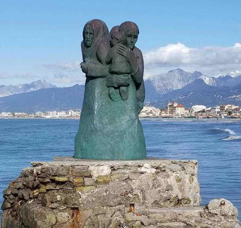 Viareggio, Italy beautiful beach, harbor and view of Carrara mountains. ouritalianjourney.com