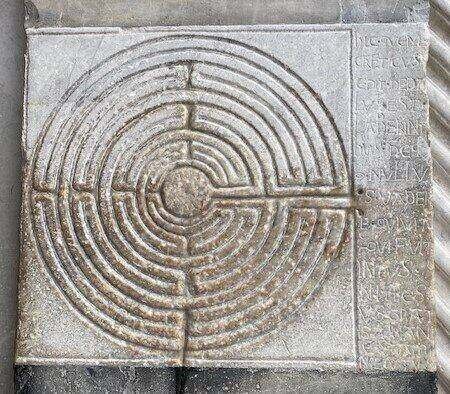 embossed labyrinth on the facade of San Martino in Lucca - ouritalianjourney.com