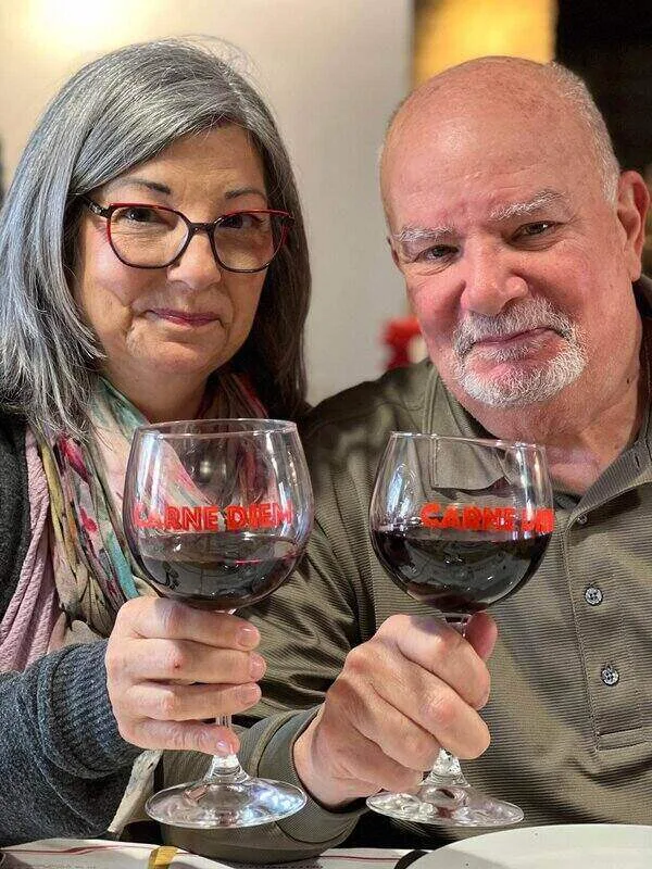 Ilene and Gary enjoying Chianti wine at Darios - ouritalianjourney.com