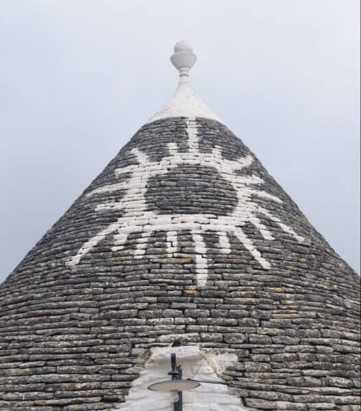 Alberobello, Trulli roof symbols - ouritalianjourney.com