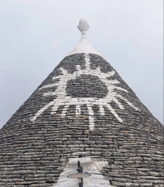 Alberobello, Trulli roof symbols - ouritalianjourney.com