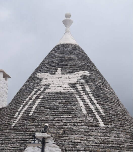 Alberobello, Trulli roof symbols - ouritalianjourney.com