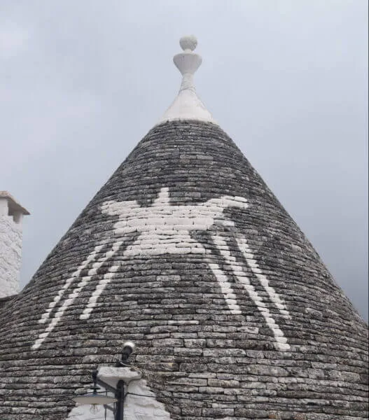Alberobello, Trulli roof symbols - ouritalianjourney.com